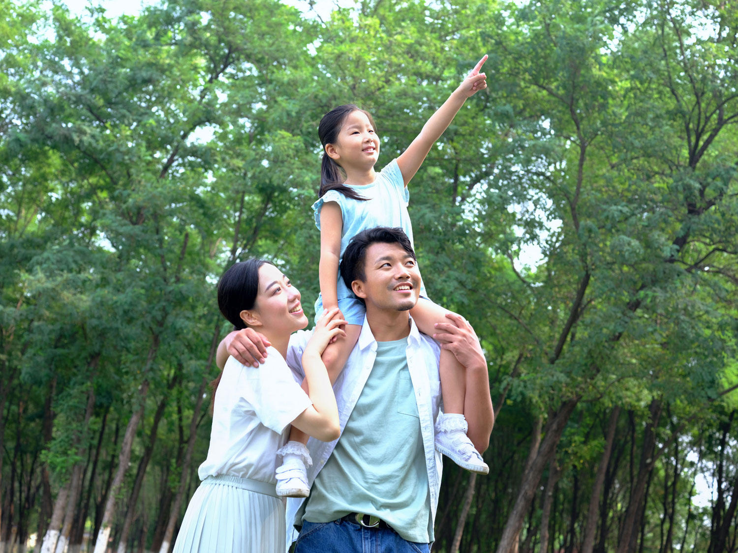 Family enjoying greenery in a family-friendly neighbourhood in Kepong